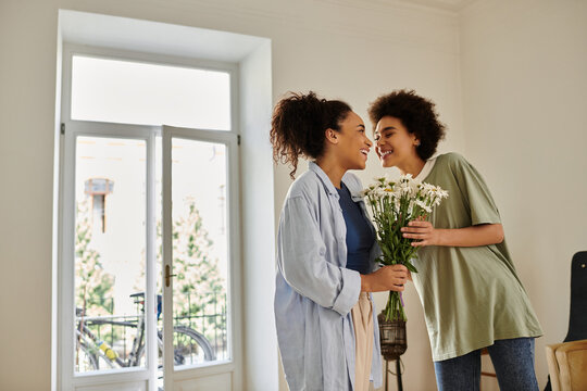 Happy couple enjoying a cozy moment in their bright modern apartment