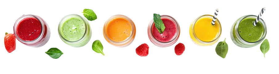 A array of colorful smoothies in glass jars. a variety of fruits and vegetables. arranged neatly on a white background. perfect for healthy lifestyle promotions