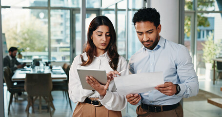 Corporate, people and document with tablet in office for planning, finance report and budget review. Team, talk and digital with financial paperwork, payroll procedure or feedback of investment offer