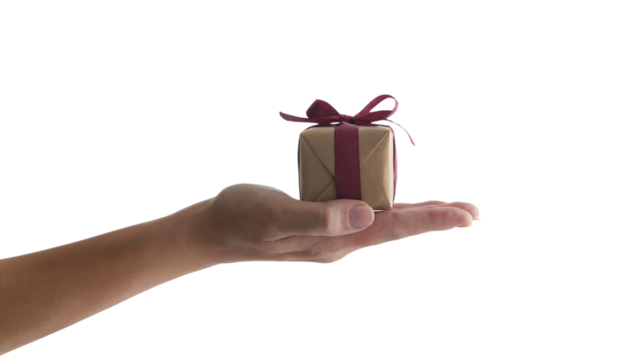 gift box with red ribbon resting on open palm . Isolated on transparent background, png