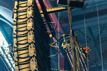 Aluminium stage components with wiring, chains and motorized mechanisms designed for lifting and...