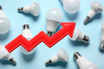 Many modern light bulbs on blue background