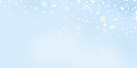 Blue sky. White snowflakes and snow falling. Christmas and New Year background.