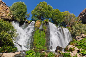 View of the famous Shaki waterfall with a height of 18 meters, located on the left side of the mountain gorge of the Vorotan River. Shaki, Syunik Province, Armenia