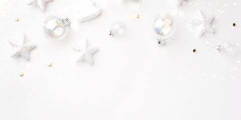 Festive Christmas ornaments on a white background.