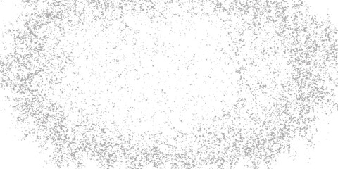 Abstract black and white grunge background with a dirty wall texture and paint splash on a gray surface