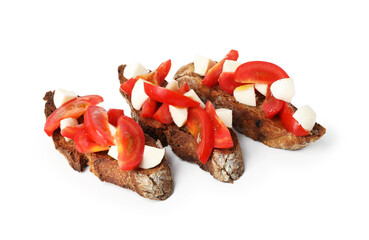 Tasty bruschettas with tomatoes and mozzarella cheese isolated on white