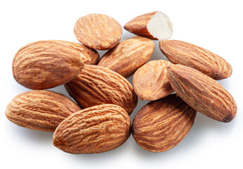 Almond nuts and cracked almonds isolated on white background. File contains clipping path.