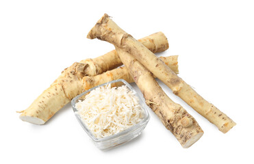 Whole and grated horseradish roots isolated on white