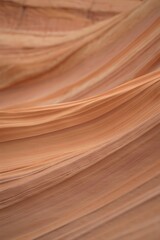 Obraz premium Sandstone canyon walls showcasing natural erosion and geological formations of the desert