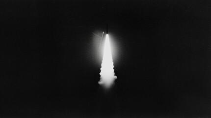 Grainy, archive black and white footage of a rocket launch. Spaceship takeoff. Spacecraft liftoff - Powered by Adobe