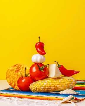 Mexican key ingredients on a yellow background