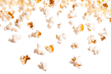 A overhead view of scattered popcorn kernels on a clean white background. ideal for food-related content. snack promotions. or culinary articles