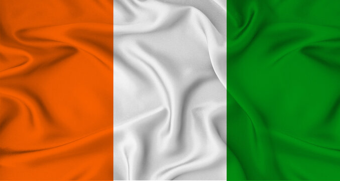 Realistic Ivory Coast flag waving. Close up of flag of Ivory Coast with cloth texture
