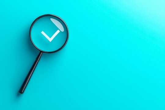 Magnifying glass highlighting a checkmark symbol on a vibrant blue background