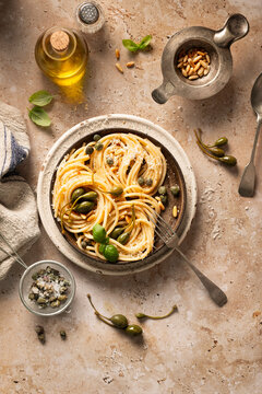 eolian spaghetti with basil, pine nuts and caper fruit