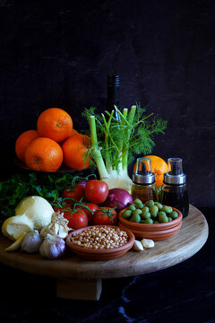 Mediterranean diet, including traditional fresh fruit, vegetables, legumes, and herbs from the warm climate countries bordering the Mediterranean Sea with fresh, seasonal, and minimally processed food