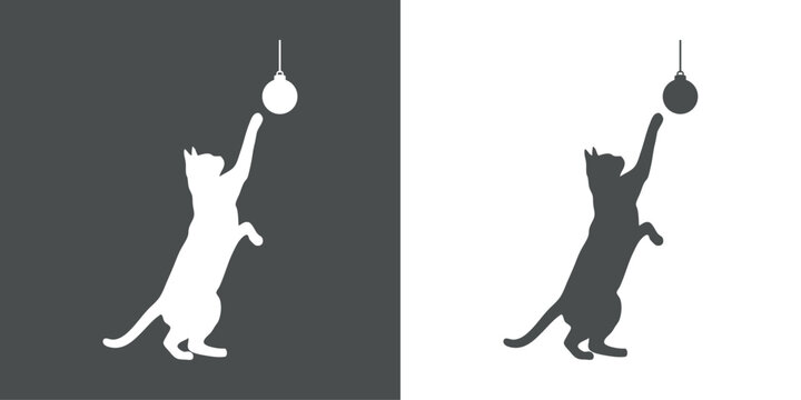 Silueta de gato jugando con una bola de navidad con hilo colgante 