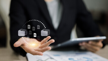Businessman Using Tablet for Digital File Management and Cloud Data Sharing