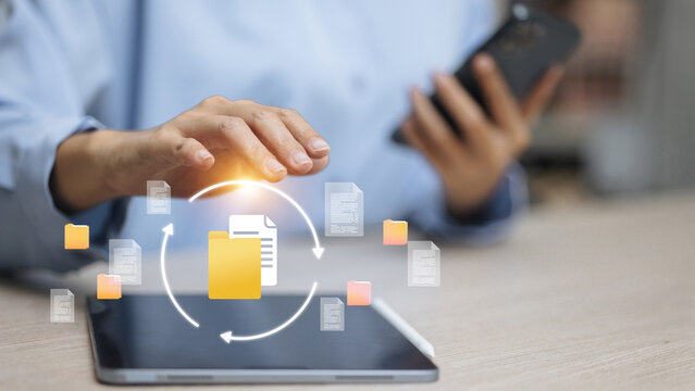Hand Using Tablet for Cloud Data Synchronization and File Management System