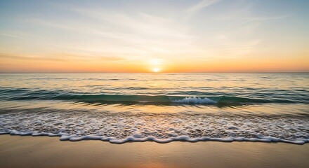 Serene Beach at Sunset - Golden Light Reflecting on Gentle Waves.