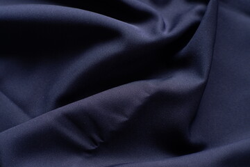abstract background with Midnight Blue Satin Fabric with Elegant Folds and Glossy Texture