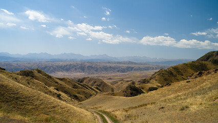 autumn landscapes in the mountains. autumn in the mountains. cloudy weather. the road in the mountain gorge