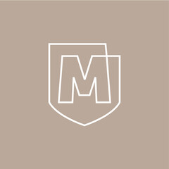 m letter shield protection security logo vector icon illustration