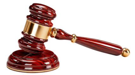 Symbol of Justice: A finely crafted gavel rests on its block, its polished wooden surface gleaming under the light. This image represents the core principles of the legal system.