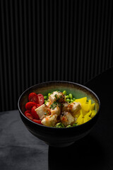 Poke bowl with chicken, tofu, yuuyama and vegetables isolated for menu