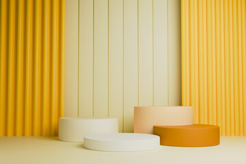 Four yellow cylindrical podiums are arranged on a surface against a scene