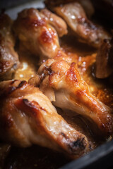 Homemade dried chicken wings on a silver tray