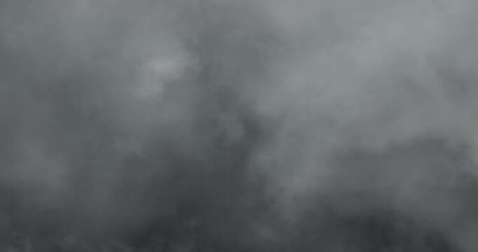 Soft cinematic 4K VFX footage of fog, smoke, and mist blending through air, creating a surreal, artistic, and vaporous atmosphere with elegant motion and dreamy haze for visual storytelling.