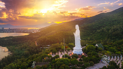Aerial Panorama Of Lady Buddha Statue Overlooking Da Nang Bay At Sunset