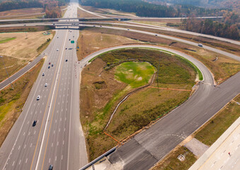 Aerial Drone View of a Turbine Style Interstate Interchange Under Construction and Nearing...