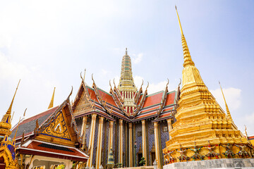 Fototapeta premium Wat Phra Kaew or Wat Phra Sri Rattana Satsadaram is temple used for various royal ceremonies during reign of King Rama I. It is temple within the Grand Palace. Inside temple is the Emerald Buddha.