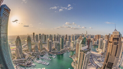 Dubai Marina skyscrapers and jumeirah lake towers view from the top aerial timelapse in the United Arab Emirates.
