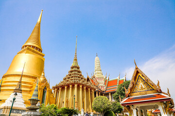 Fototapeta premium Wat Phra Kaew or Wat Phra Sri Rattana Satsadaram is temple used for various royal ceremonies during reign of King Rama I. It is temple within the Grand Palace. Inside temple is the Emerald Buddha.