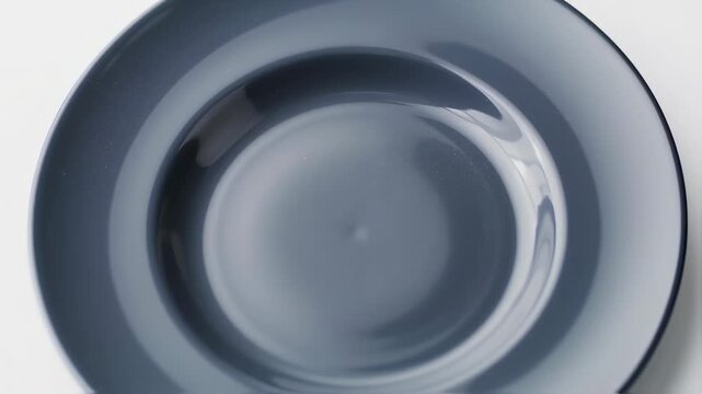 Close-up of a gray, circular dish