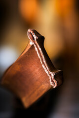 Oxidized broken copper profile, non-ferrous metal scrap, close-up of copper structure with industrial soft background