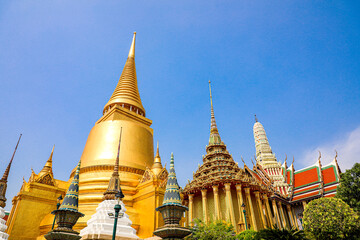 Fototapeta premium Wat Phra Kaew or Wat Phra Sri Rattana Satsadaram is temple used for various royal ceremonies during reign of King Rama I. It is temple within the Grand Palace. Inside temple is the Emerald Buddha.