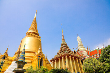 Fototapeta premium Wat Phra Kaew or Wat Phra Sri Rattana Satsadaram is temple used for various royal ceremonies during reign of King Rama I. It is temple within the Grand Palace. Inside temple is the Emerald Buddha.