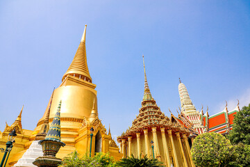 Fototapeta premium Wat Phra Kaew or Wat Phra Sri Rattana Satsadaram is temple used for various royal ceremonies during reign of King Rama I. It is temple within the Grand Palace. Inside temple is the Emerald Buddha.