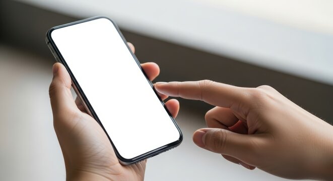 Person using mobile phone tapping the screen for banking or social media updates at home