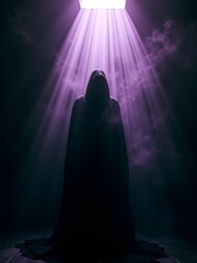 Hooded figure in shadow with purple light
