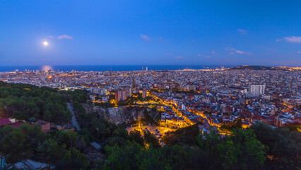 View of Barcelona day to night timelapse, the Mediterranean sea, The tower Agbar and The twin...
