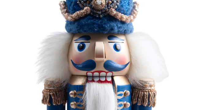 Classic nutcracker soldier in blue uniform and white beard isolated on white background