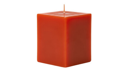 Isolated orange wax candle in block shape for decoration at home or in interior design