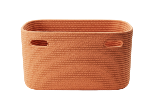 Isolated orange rope basket for laundry, home storage or decorations, organizer box indoors