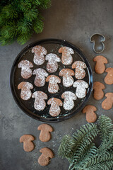 Christmas homemade gingerbread cookies on wooden table